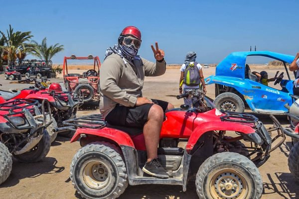 A-wonderful-shot-of-a-person-riding-a-quad-bike-from-one-of-the-safari-trips-in-Hurghada