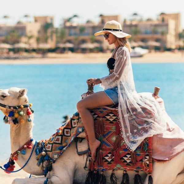 a-wonderful-picture-of-a-tourist-riding-a-camel-on-one-of-the-beaches-of-the-red-sea